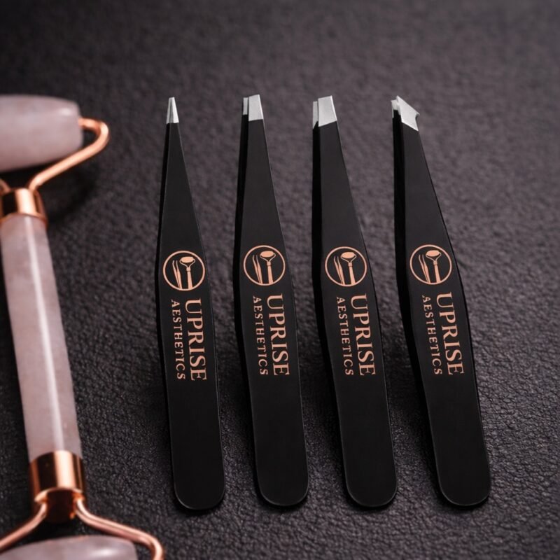 Professional black eyebrow tweezers set by Uprise Aesthetics stainless steel precision beauty tools for eyebrow shaping.