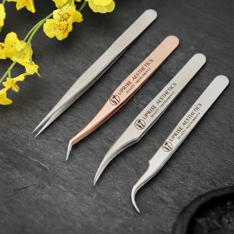 Professional eyelash extension tweezers set by Uprise Aesthetics including isolation and volume lash tweezers made from stainless steel.